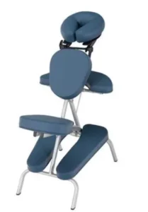 A portable massage chair with a navy blue padded surface and silver metal frame, featuring a headrest, armrests, and a seat for relaxation or therapeutic use.