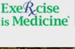 Text logo reading "Exercise is Medicine" with a stylized blue 'Rx' symbol in the center, displayed against a neutral background.