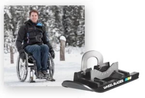 A man sitting in a wheelchair demonstrating wheel blades for skiing with a close up view of wheel blades