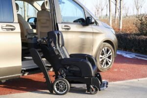 a person in a wheelchair is transferring into an accessible van
