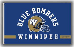 A blue flag featuring the text "BLUE BOMBERS" above the word "WINNIPEG" and a gold football helmet with a white "W" logo. The design emphasizes the Winnipeg Blue Bombers Accessibility.