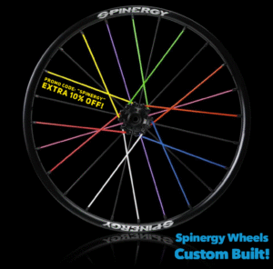 wheelchair wheel with multicolor spokes with the shiny black tire