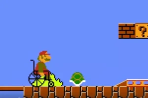 S Mario in a wheelchair is rolling along across the bridge and season obstacle the turtle and some bumps ahead of him against a blue sky and on red bricks